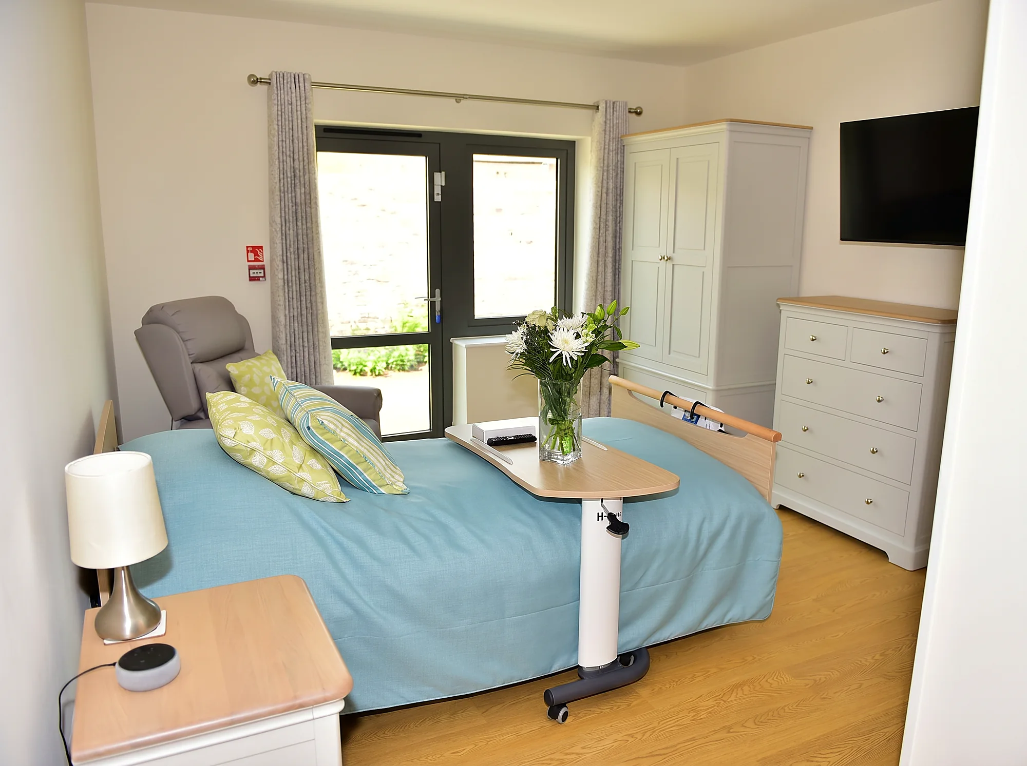 A bedroom with garden views at Castle House