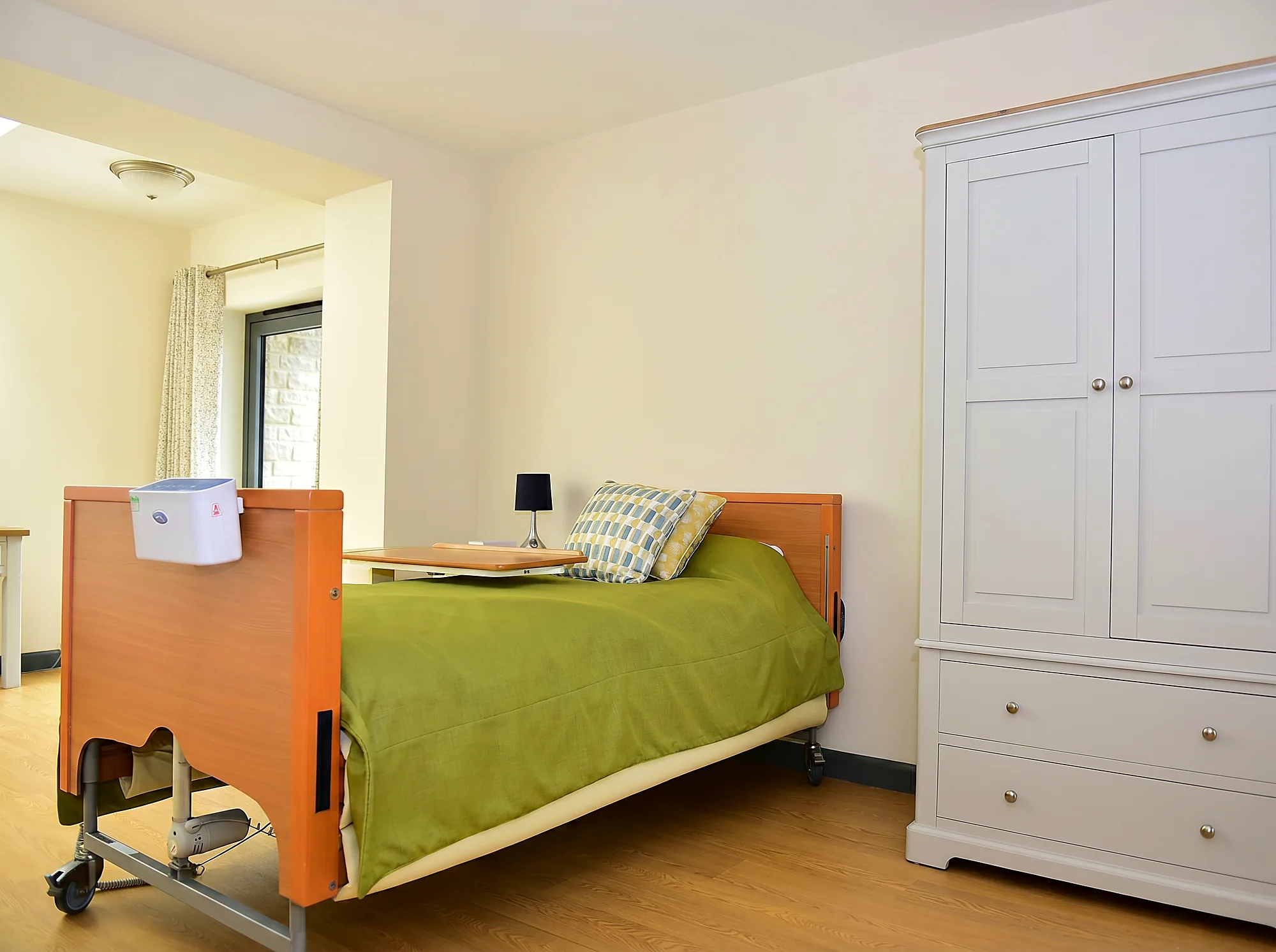 A comfortable bedroom with a wardrobe at Castle House