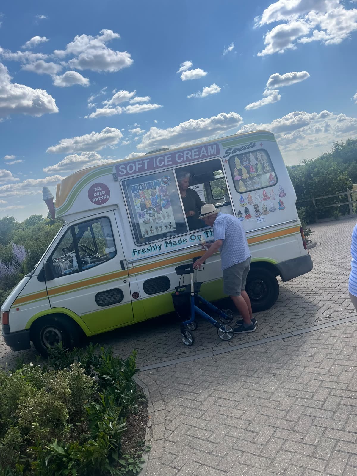 The ice cream van visiting Castle House, with a resident ordering at the hatch
